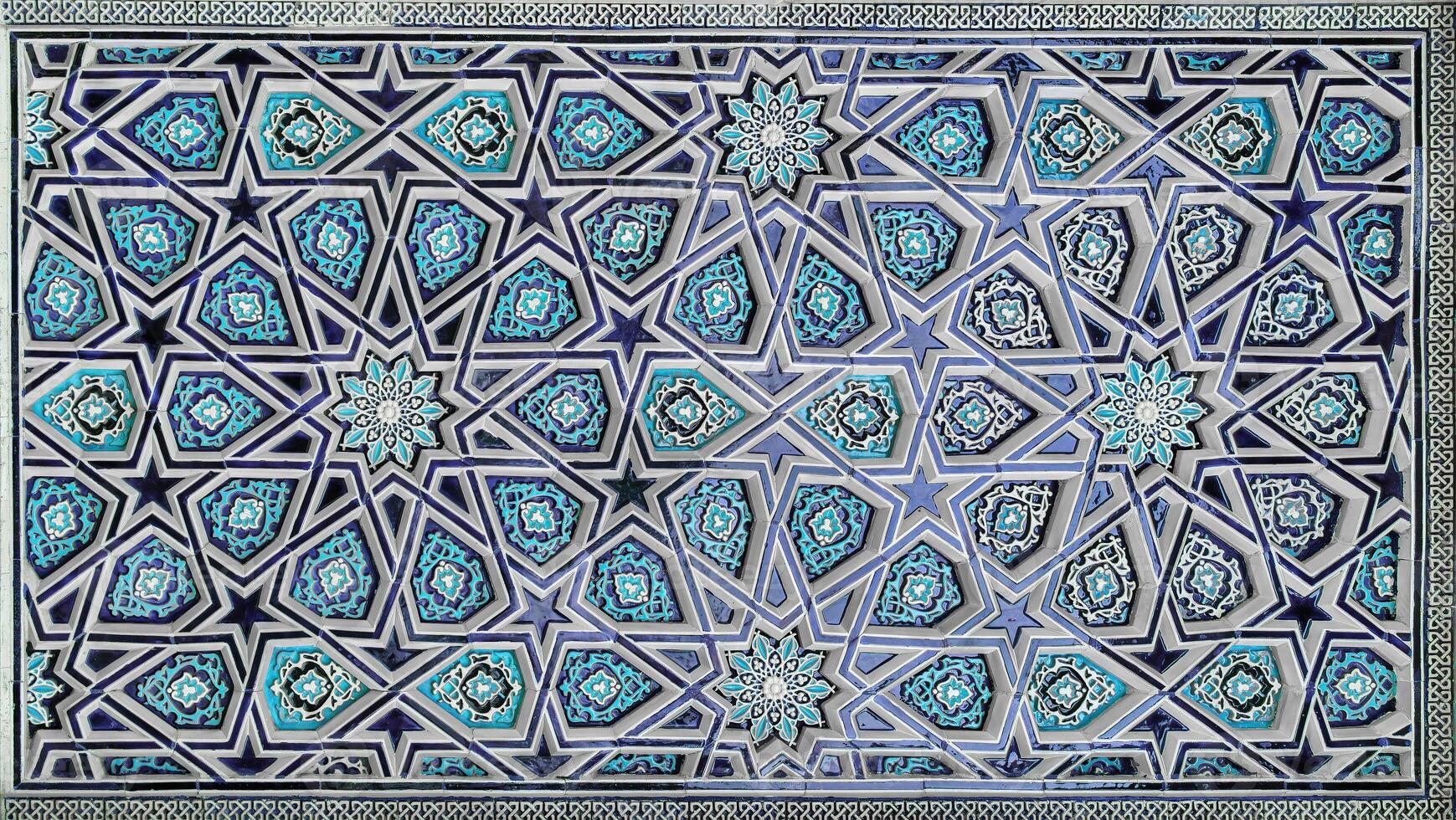 Geometric traditional Islamic ornament. Fragment of a ceramic mosaic. photo