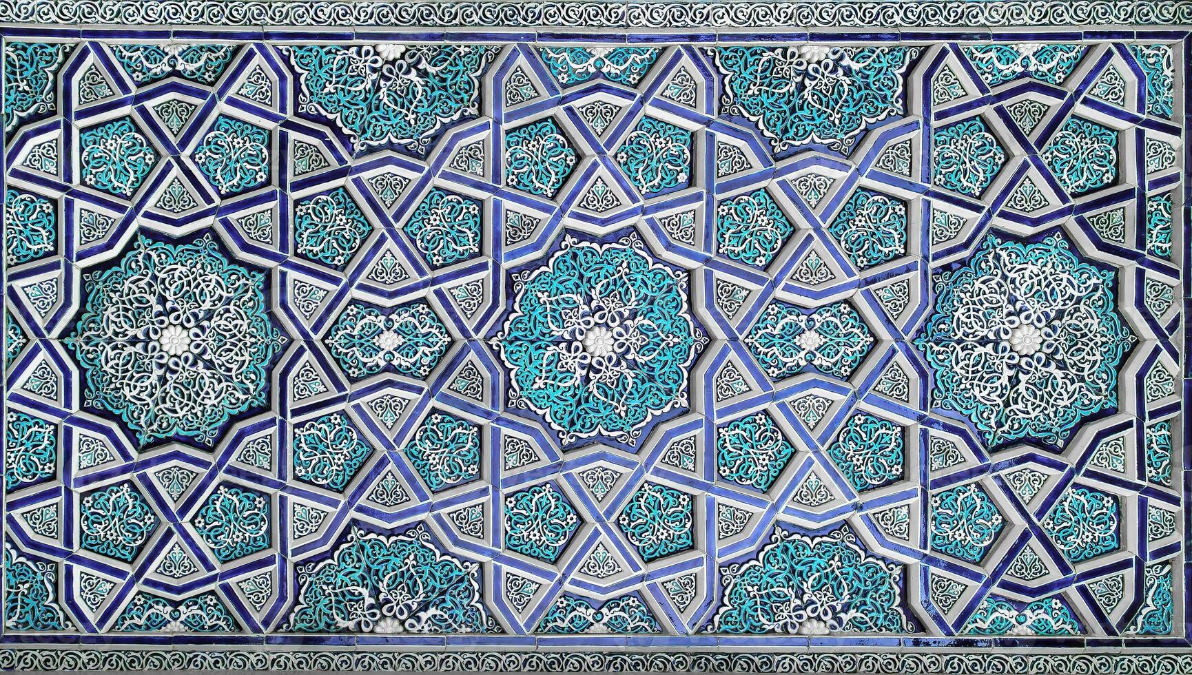 Geometric traditional Islamic ornament. Fragment of a ceramic mosaic. photo