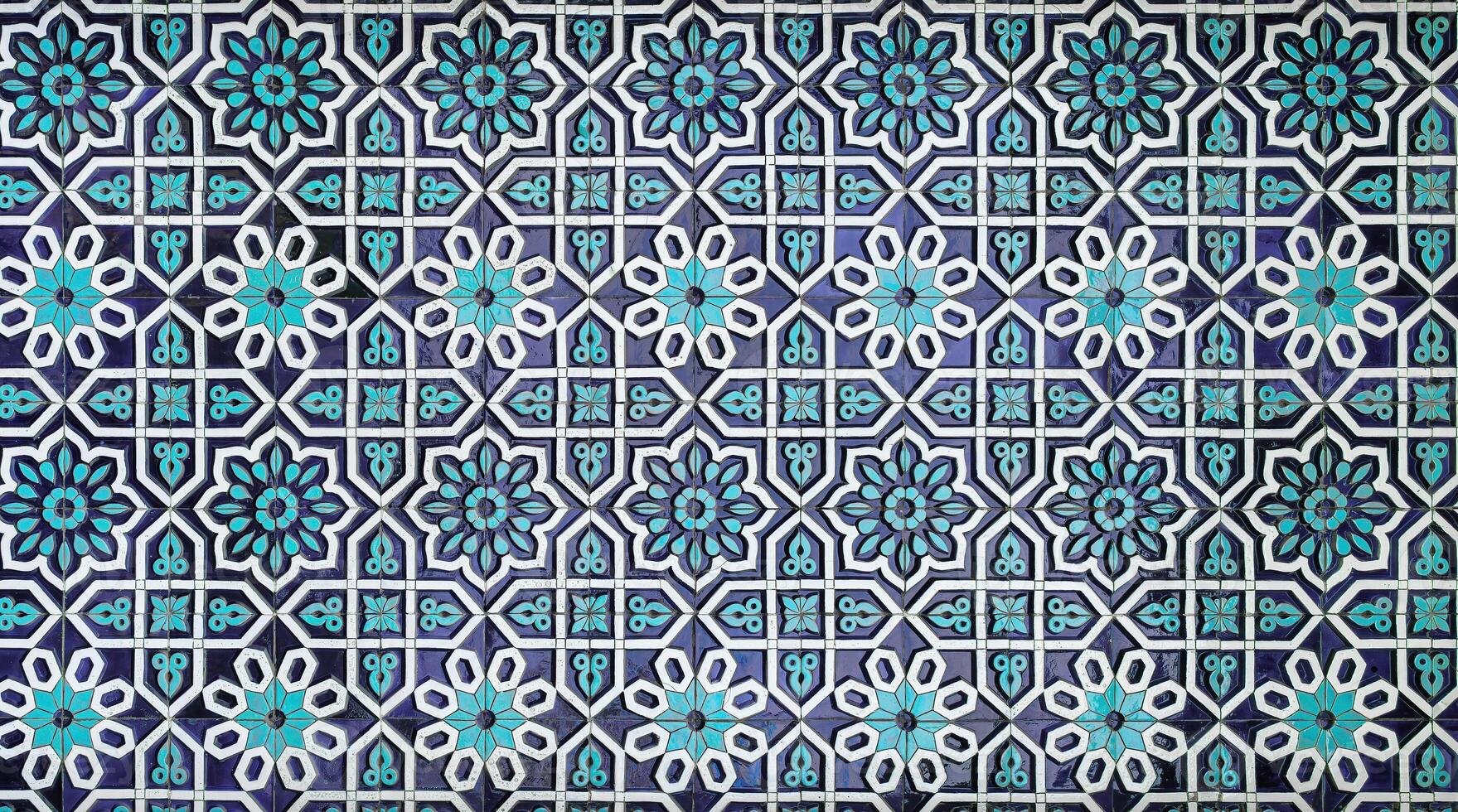 Geometric traditional Islamic ornament. Fragment of a ceramic mosaic. photo