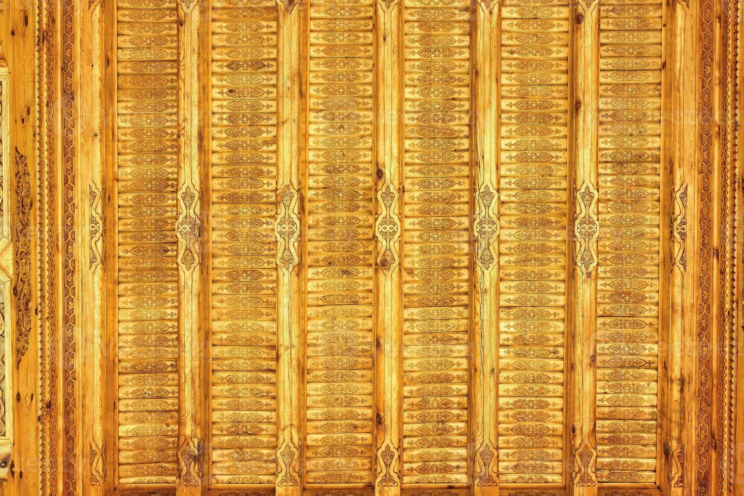 Fragment of an ancient carved wooden pattern. Ornate. Abstract background. photo