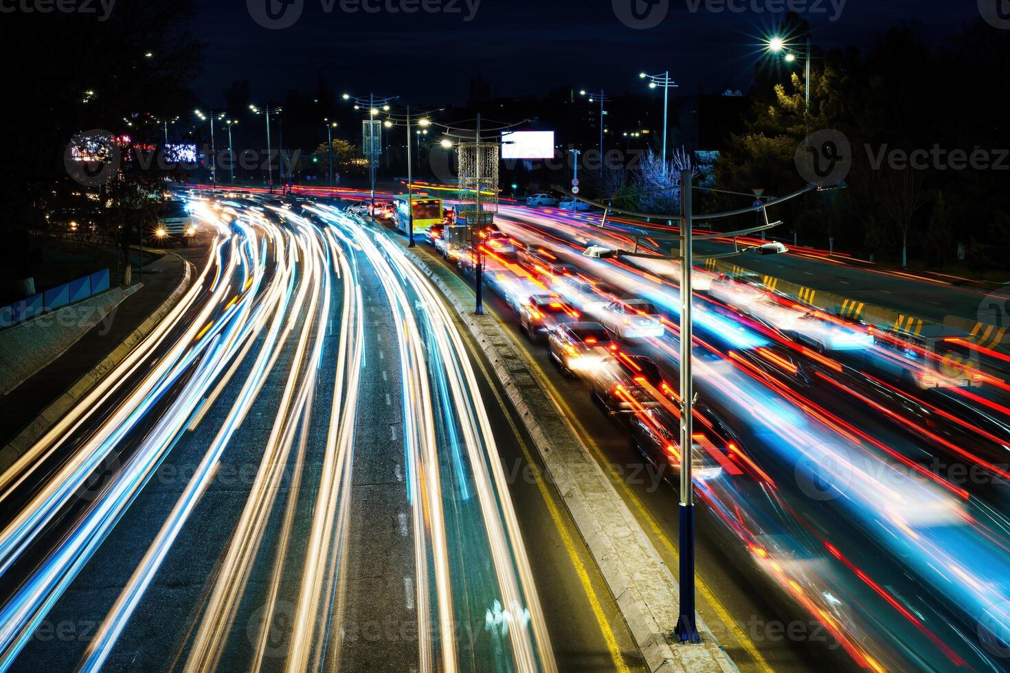 Car traffic light at night city. photo