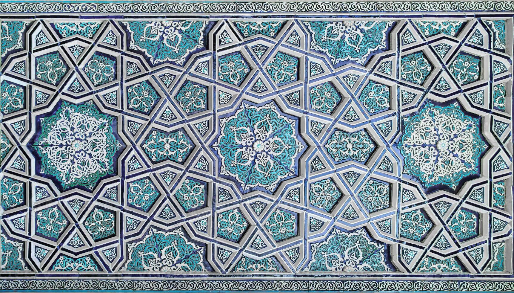 Geometric traditional Islamic ornament. Fragment of a ceramic mosaic. photo