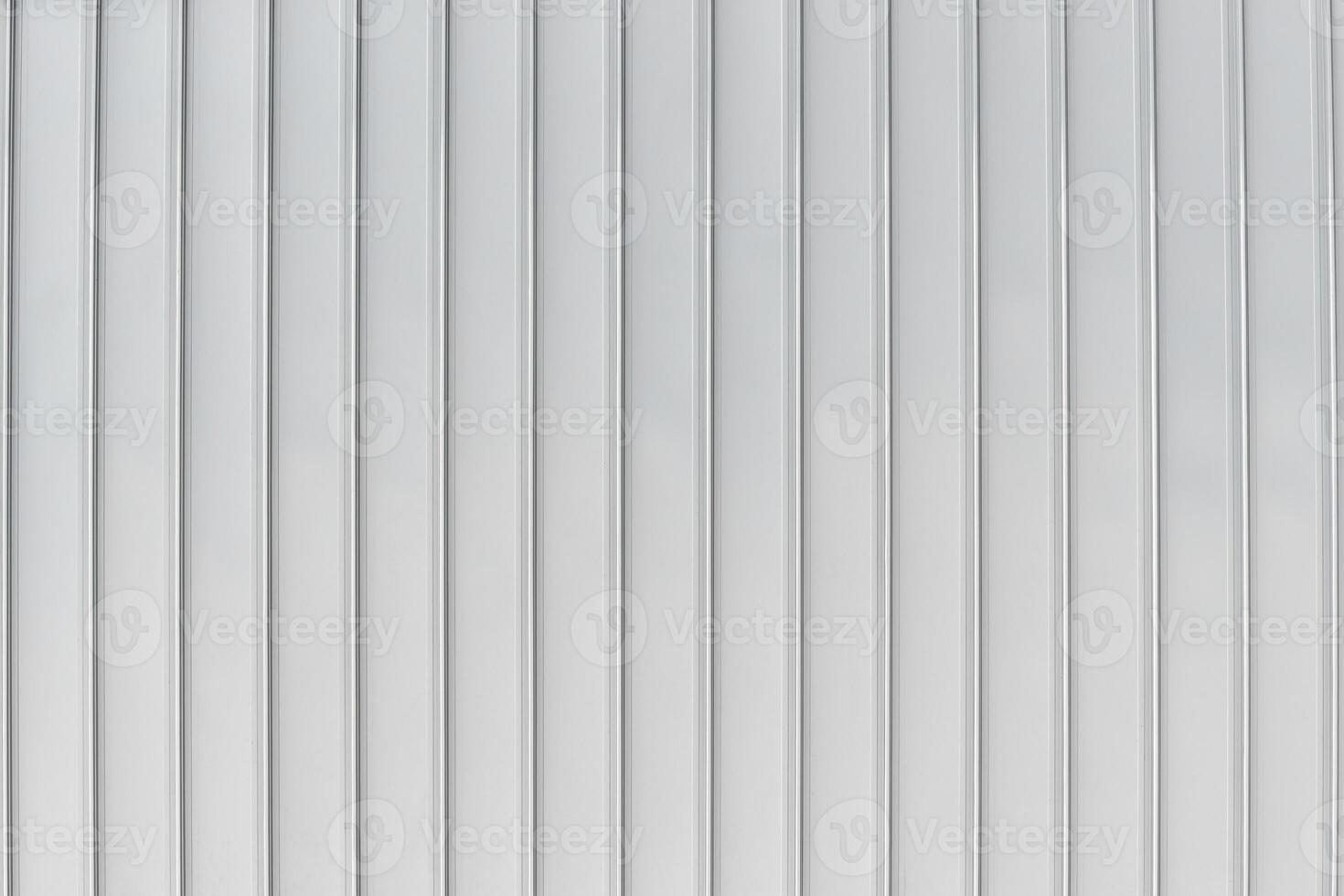 The texture of the cladding of the building from metal aluminum panels. Abstract background. photo