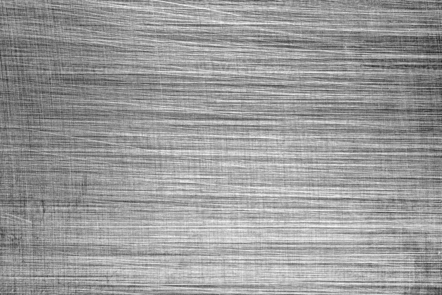 monocromo textura de brillante rayado metal. resumen antecedentes. foto