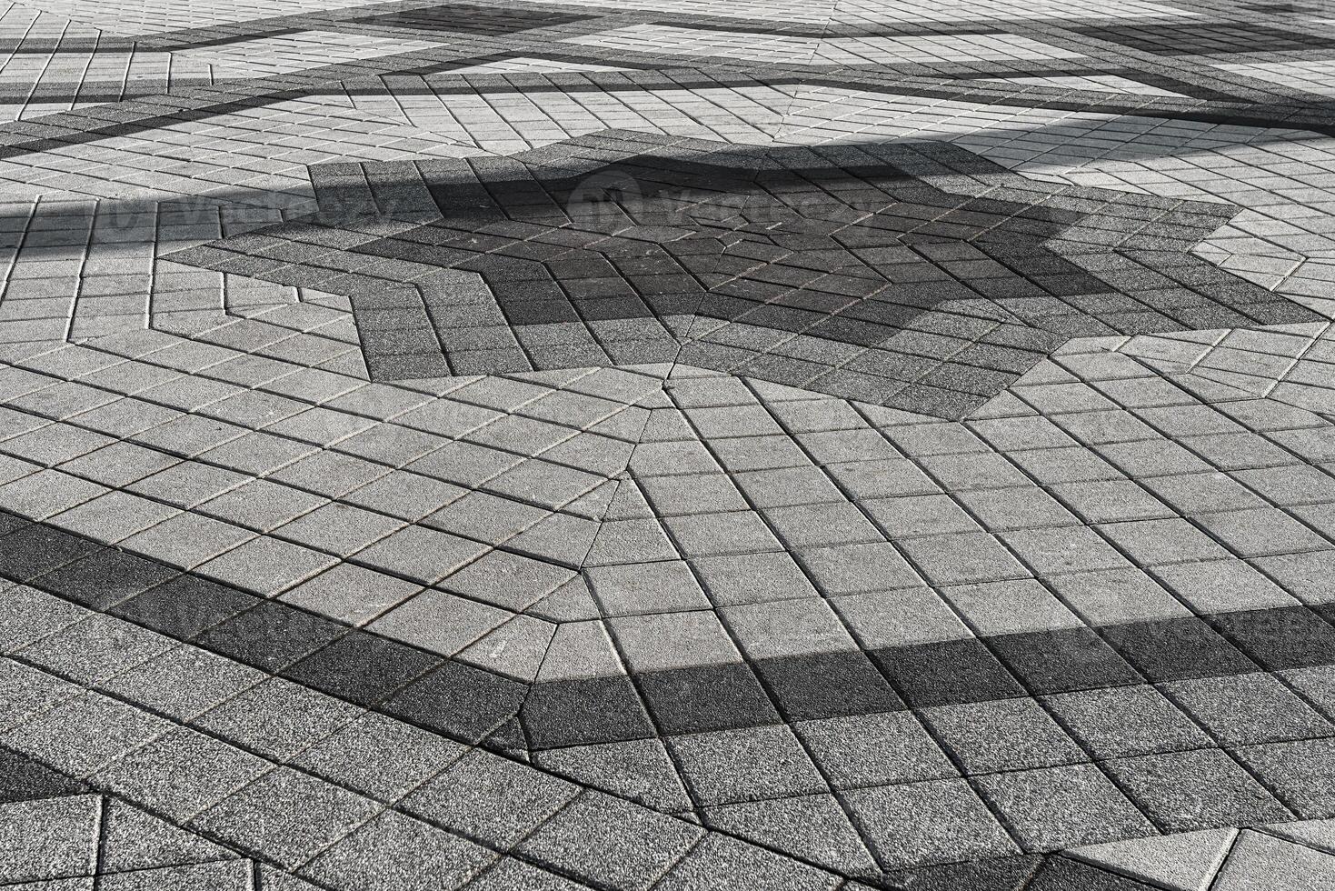 el textura de un Roca antiguo pavimento con un perspectiva. foto
