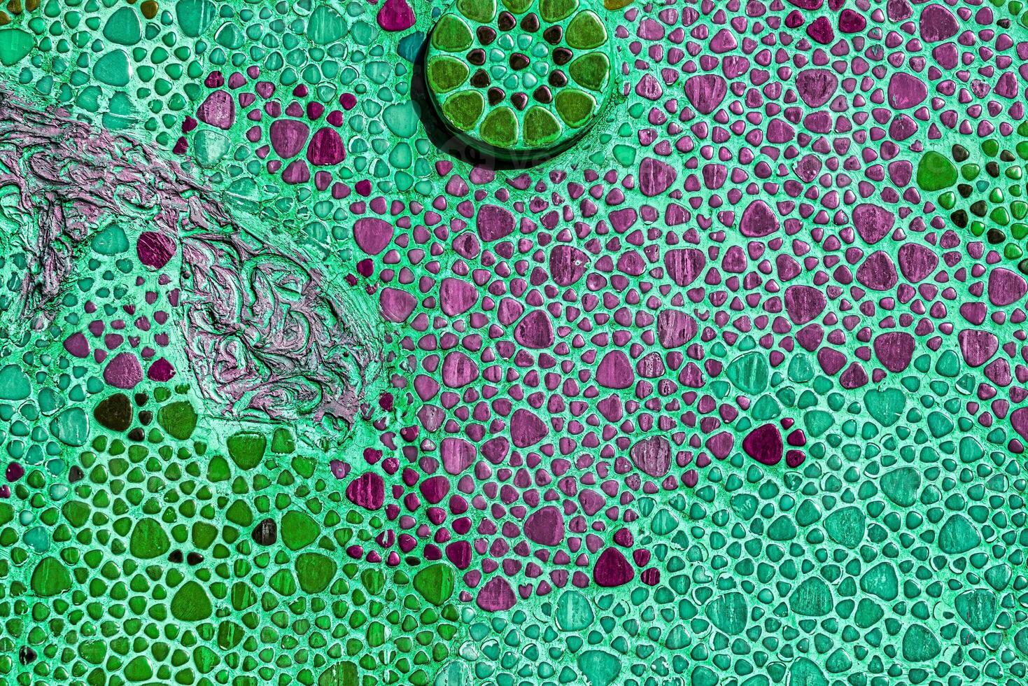 Traditional Islamic ornament. Fragment of a ceramic mosaic. photo