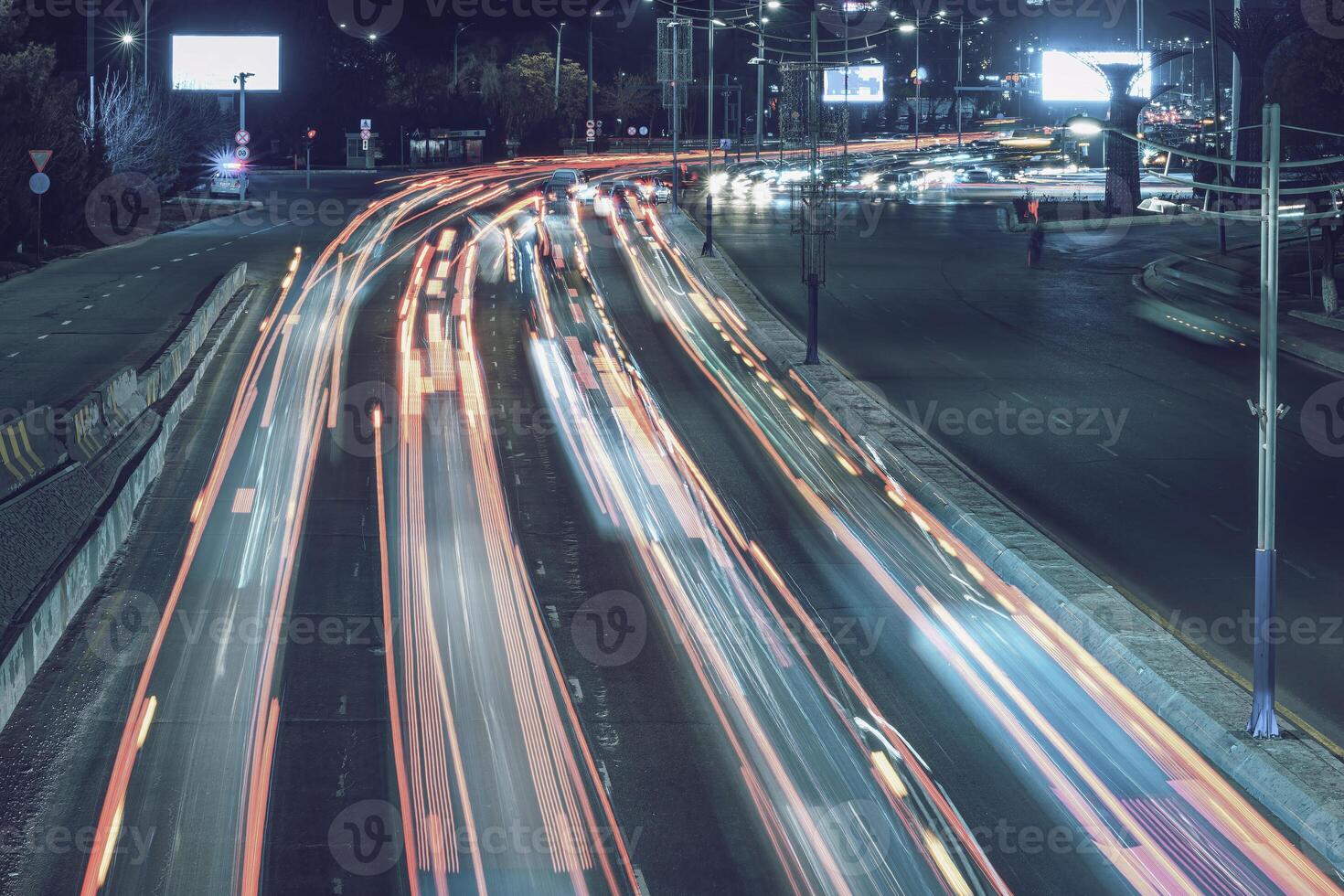 Car traffic light at night city. photo