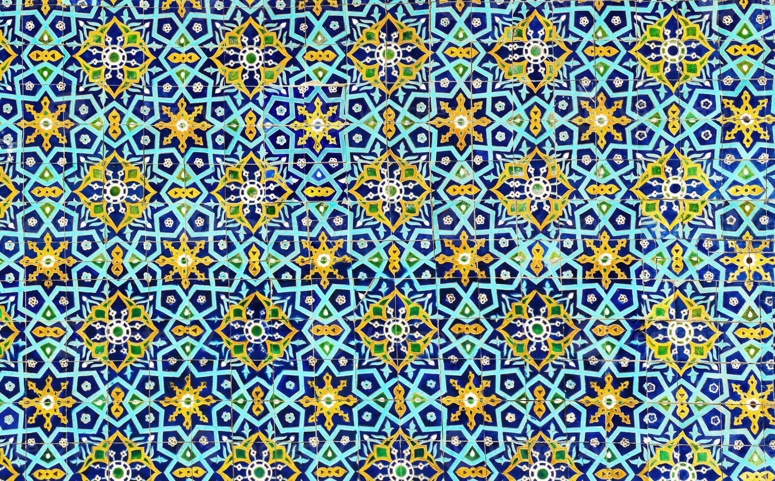 Geometric traditional Islamic ornament. Fragment of a ceramic mosaic. photo