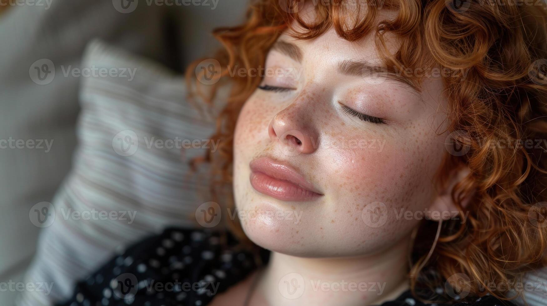 Close up of a person resting in bed photo