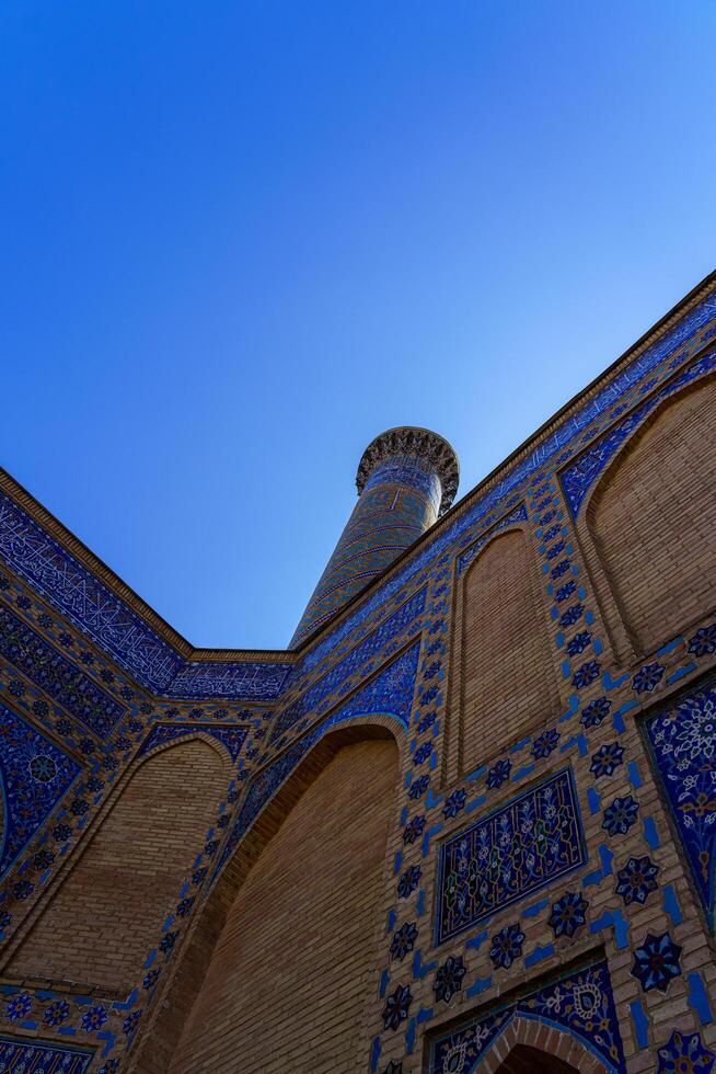 Samarkand, Uzbekistan - September 27, 2023 Gur-Emir Mausoleum of Tamerlane in a daytime, Samarkand, Uzbekistan. photo