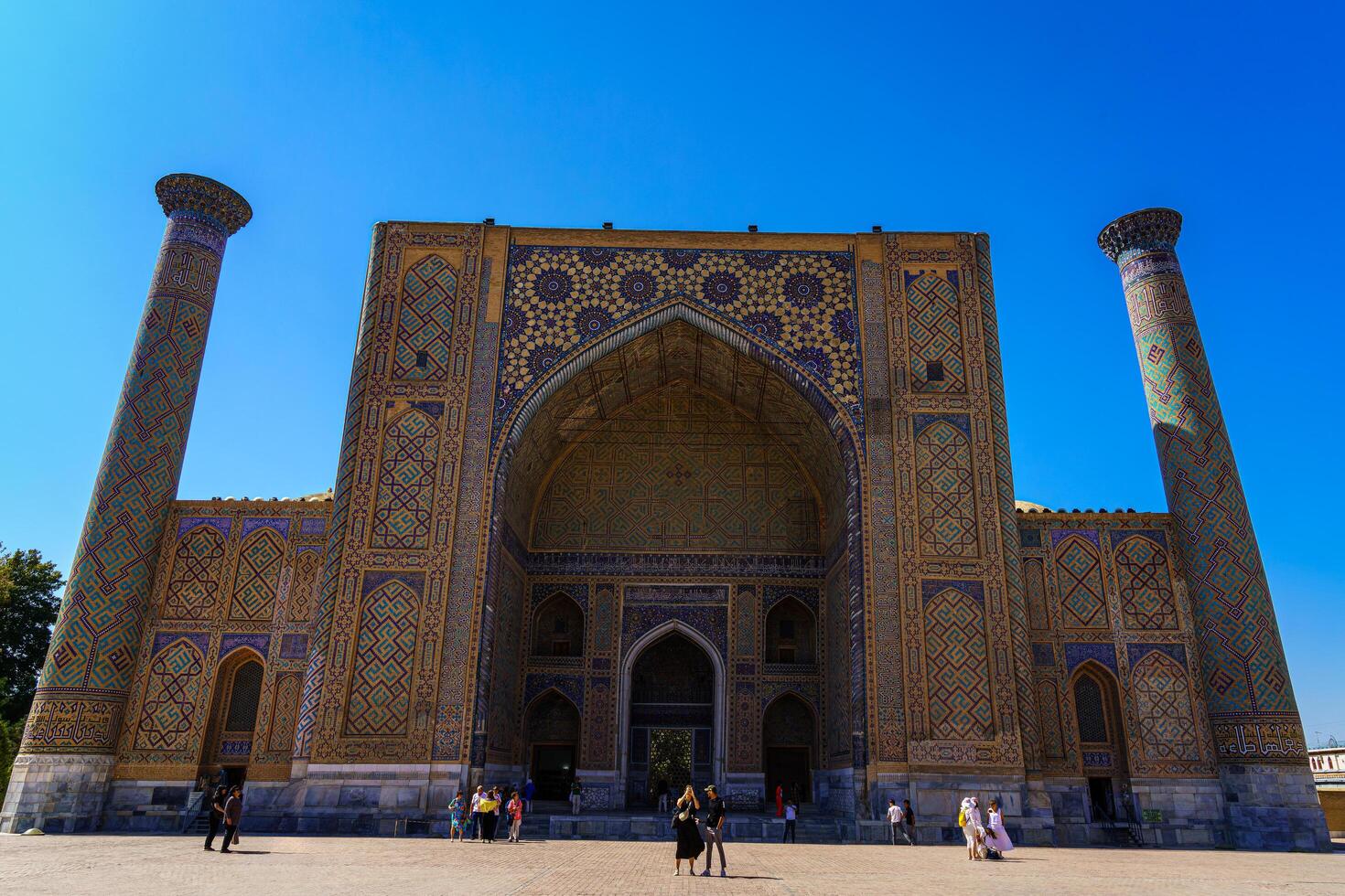 Samarkand, Uzbekistan - September 27, 2023 Registan Square with Ulugbek Madrassah, the famous square in Samarkand, included in the UNESCO World Heritage Site. photo