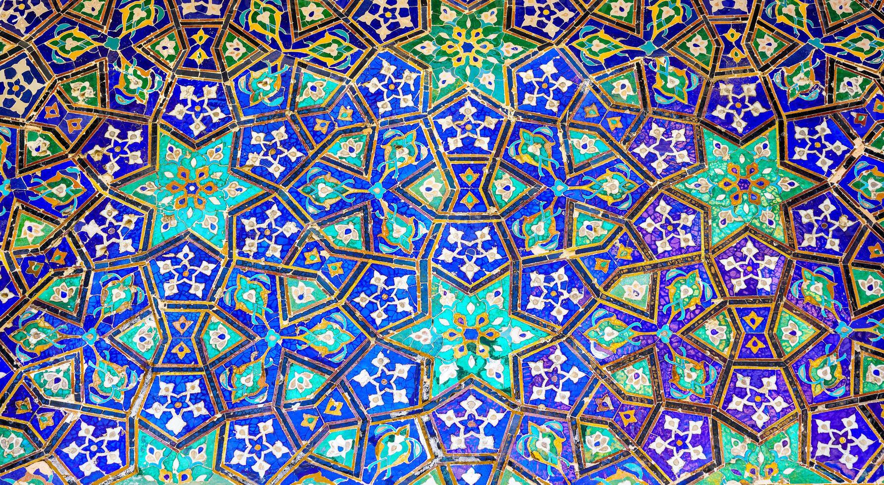 Geometric traditional Islamic ornament. Fragment of a ceramic mosaic. photo