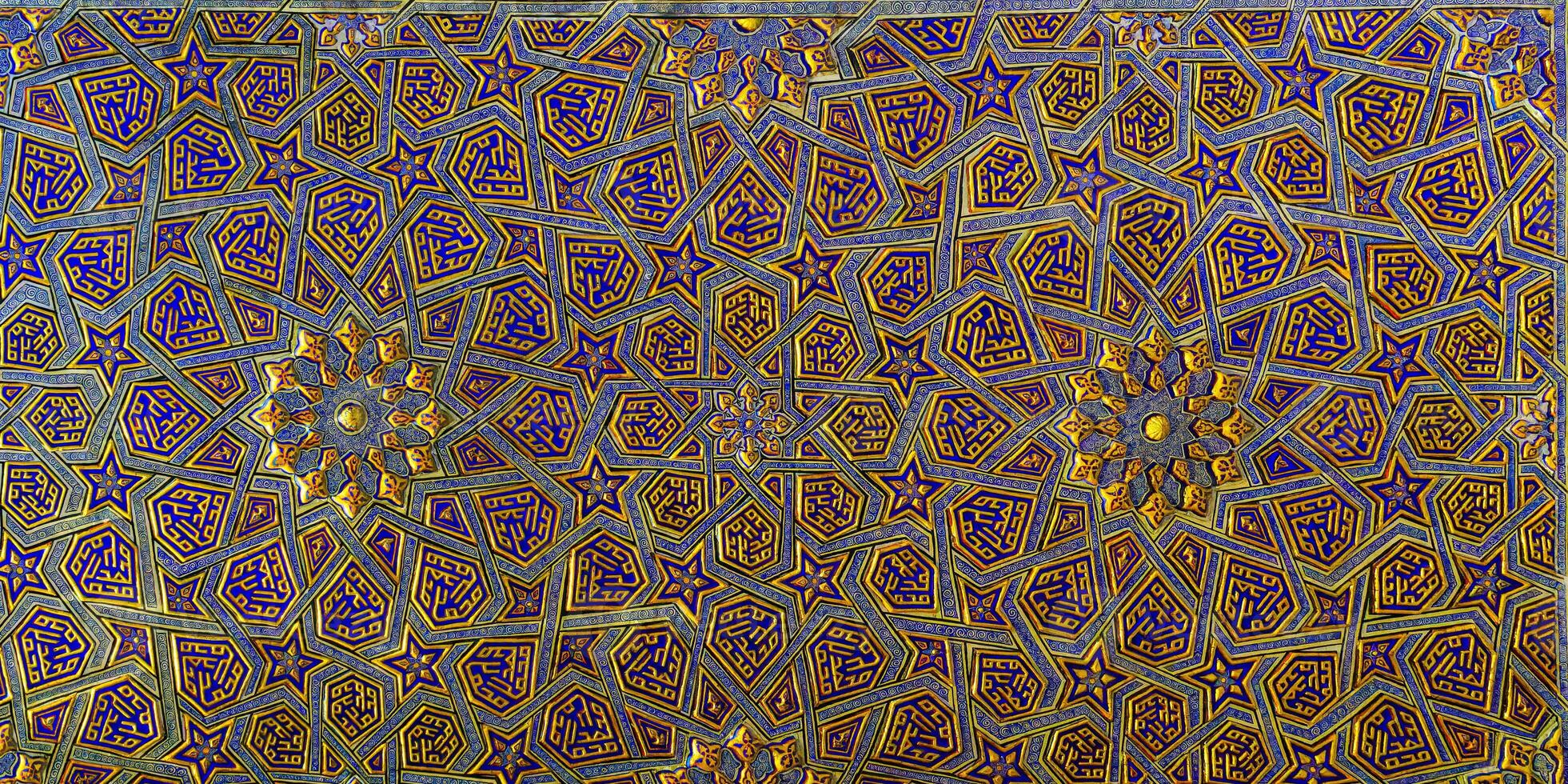 Ornament of the interior of the Gur Emir mausoleum in Samarkand, Uzbekistan. Muslim oriental traditional geometric ornament. photo