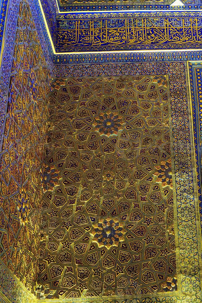 Ornament of the interior of the Gur Emir mausoleum in Samarkand, Uzbekistan. Muslim oriental traditional geometric ornament. photo