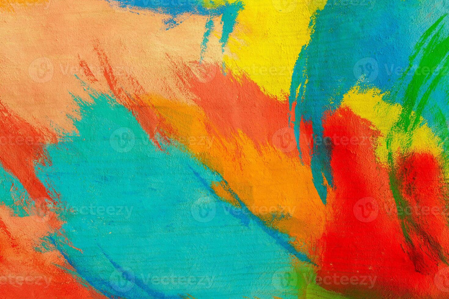 A fragment of colorful graffiti painted on a wall. Abstract urban background. Spray painting art. photo