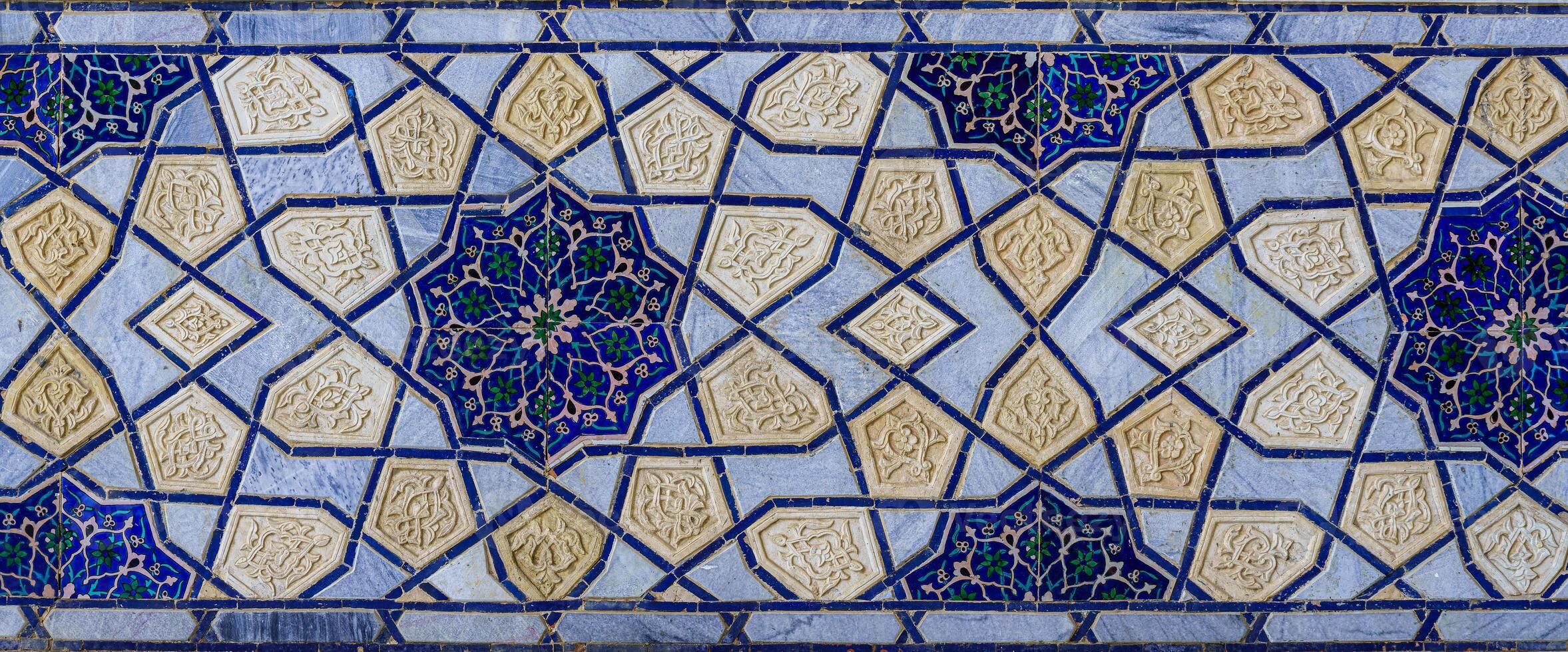 Geometric traditional Islamic ornament. Fragment of a ceramic mosaic. photo