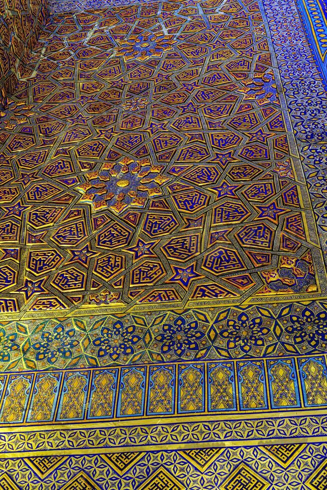 Ornament of the interior of the Gur Emir mausoleum in Samarkand, Uzbekistan. Muslim oriental traditional geometric ornament. photo