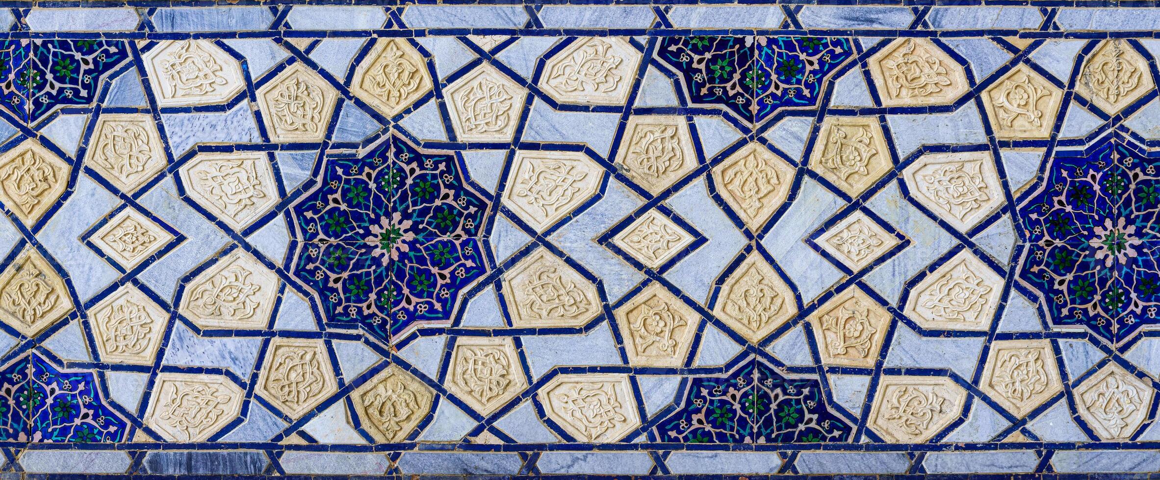 Geometric traditional Islamic ornament. Fragment of a ceramic mosaic. photo