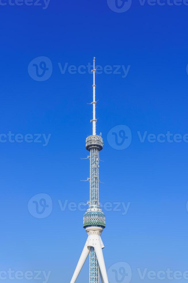 Tashkent Television Tower, Uzbekistan on a blue sky background. photo