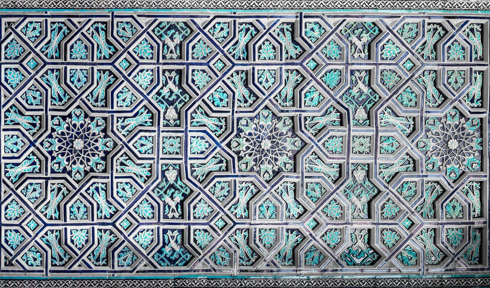 Geometric traditional Islamic ornament. Fragment of a ceramic mosaic. Abstract background. photo