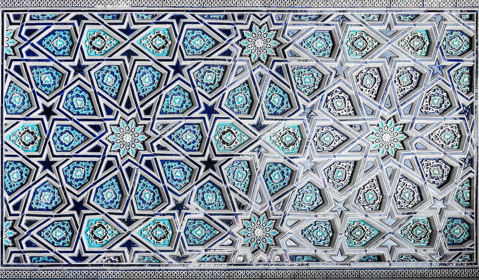 Geometric traditional Islamic ornament. Fragment of a ceramic mosaic. Abstract background. photo