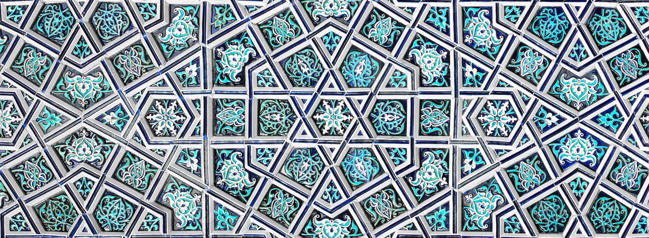 Geometric traditional Islamic ornament. Fragment of a ceramic mosaic. Abstract background. photo