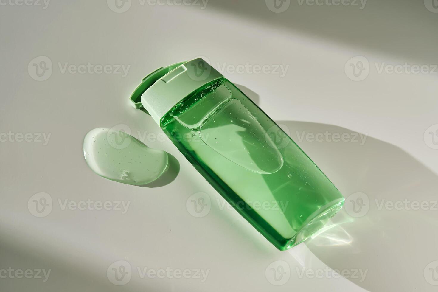 Shower gel or shampoo on a white background with sun light. photo