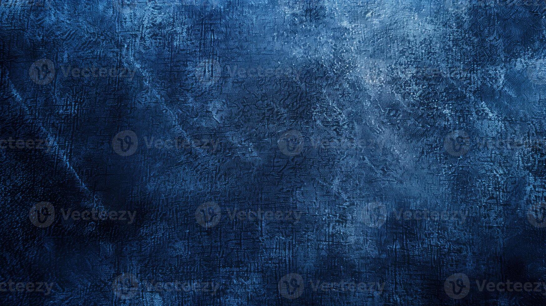 Textured indigo blue background with abstract patterns. photo