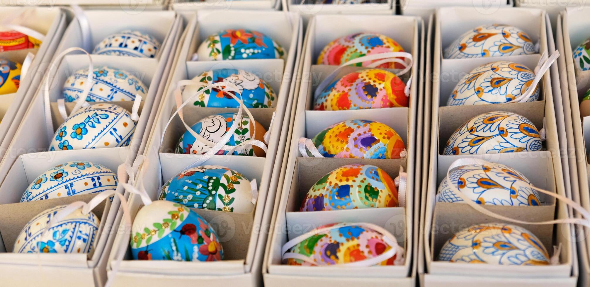 Beautiful colorful decor for Easter. Traditional Easter painted colorful eggs are sold at a market in Prague, Czech Republic. photo