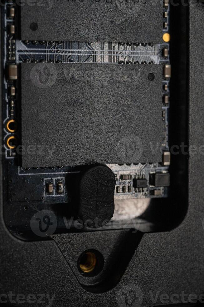Open SSD Case with inside High-Speed M.2 on black background, External USB Drive photo