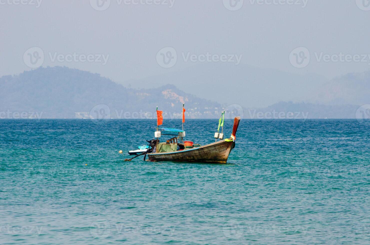 Views of the Islands of Thailand and turquoise water, rocks, yachts or boats photo