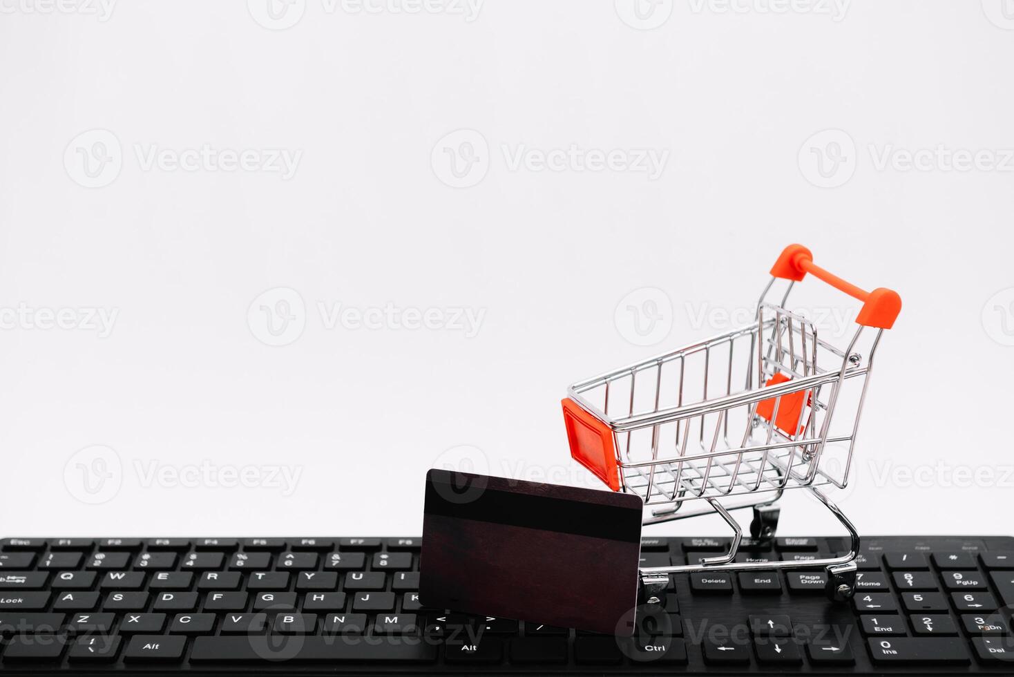 online shopping or internet shop concepts, with shopping cart symbol. isolated. photo