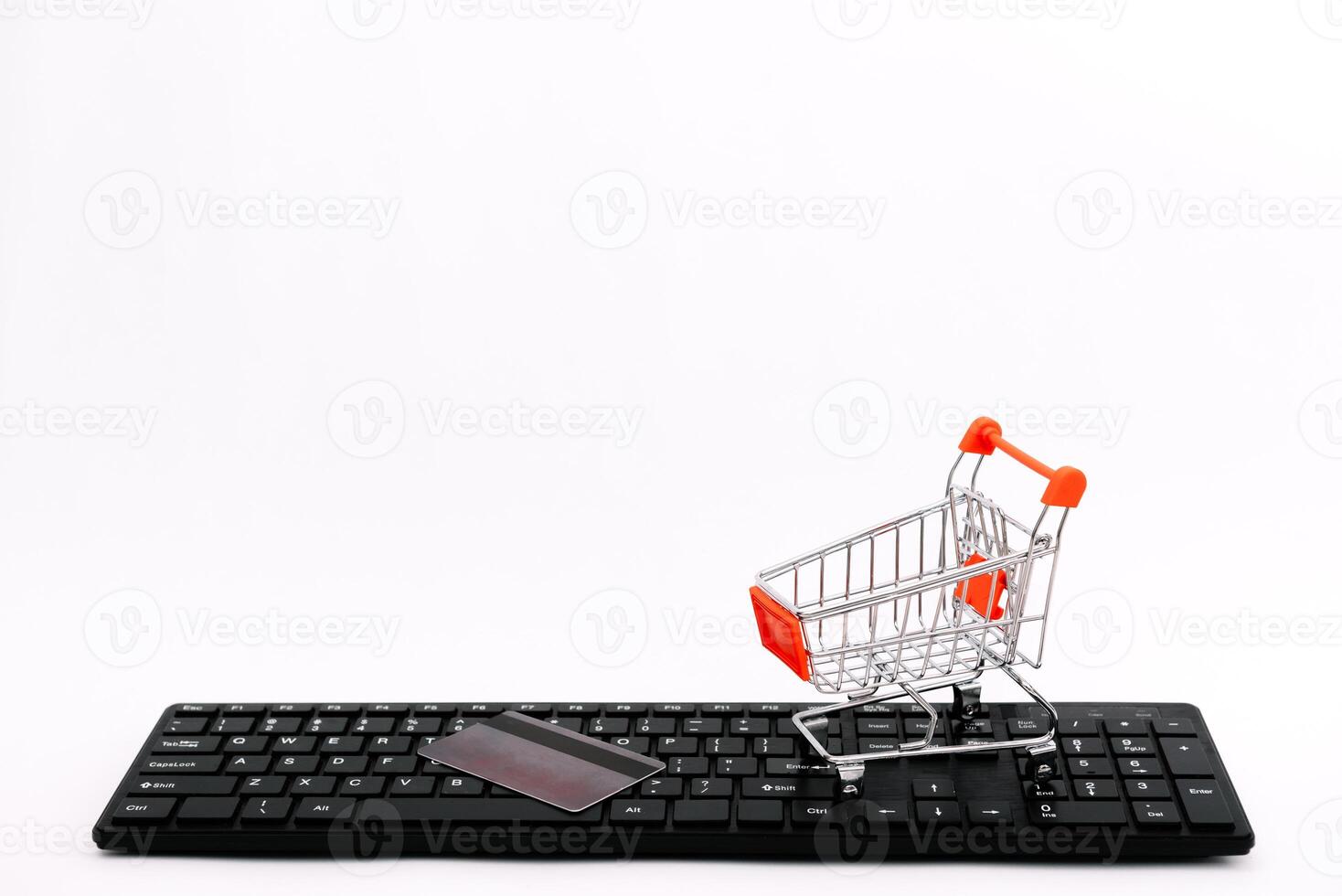 online shopping or internet shop concepts, with shopping cart symbol. isolated. photo