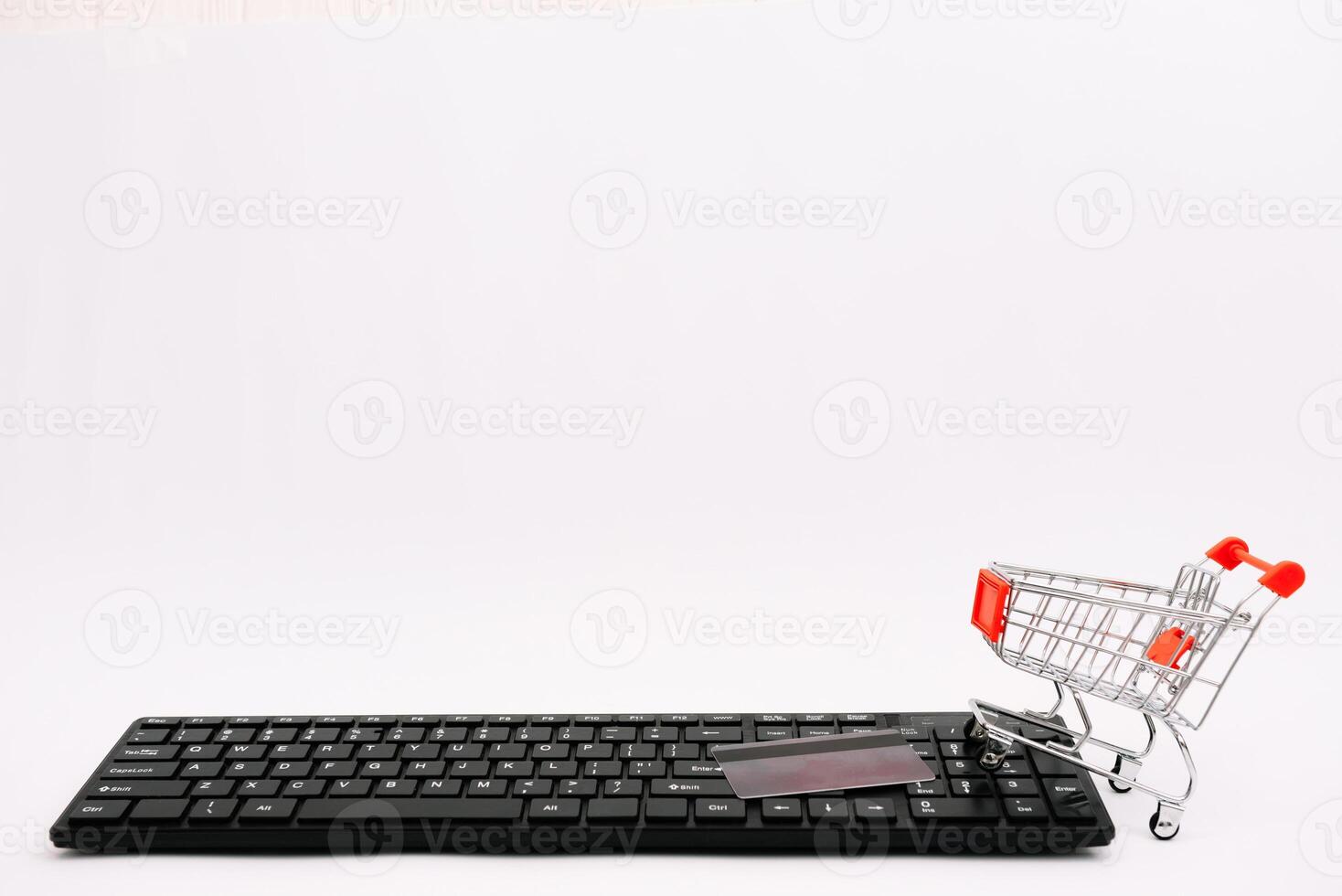 online shopping or internet shop concepts, with shopping cart symbol. isolated. photo