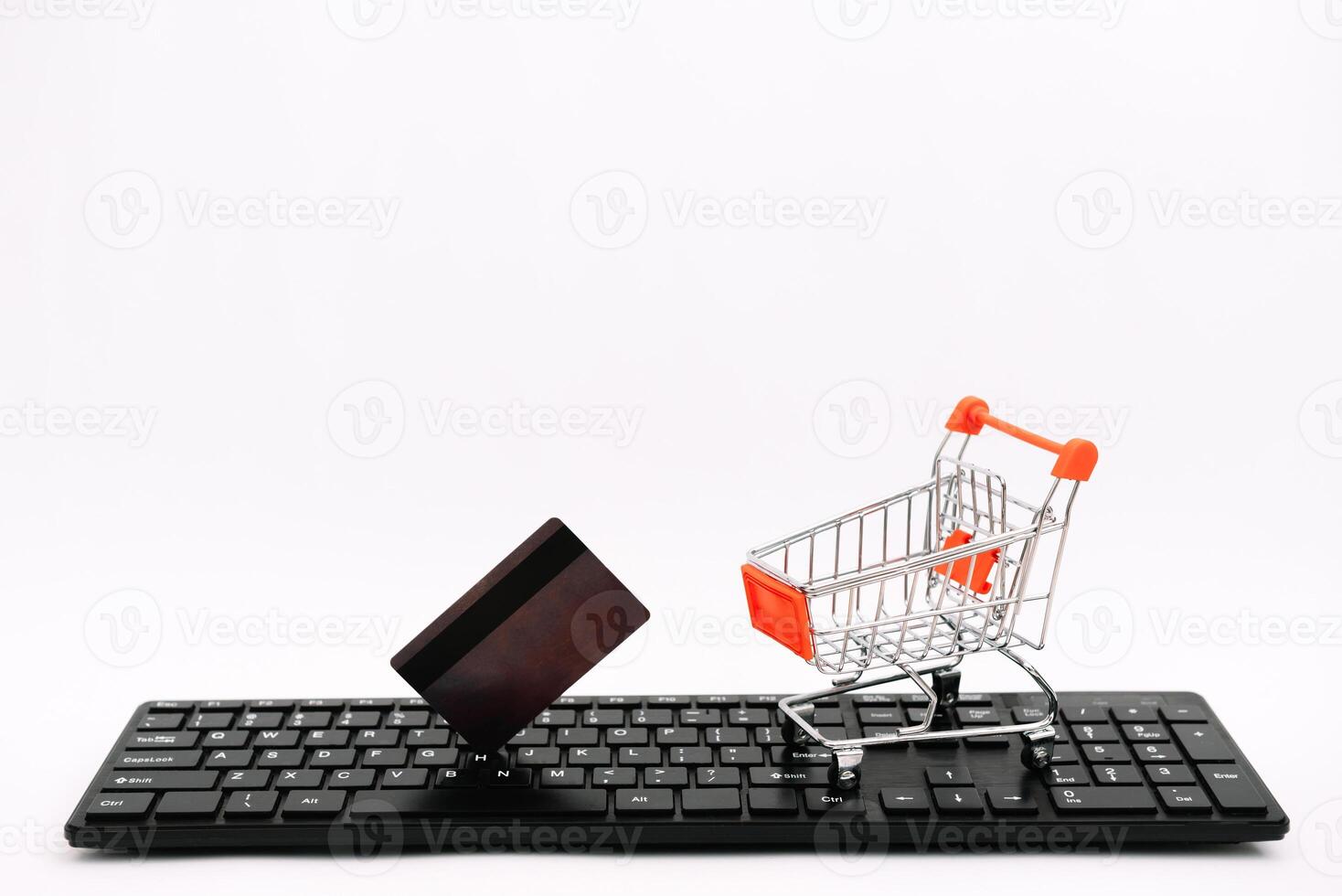 online shopping or internet shop concepts, with shopping cart symbol. isolated. photo