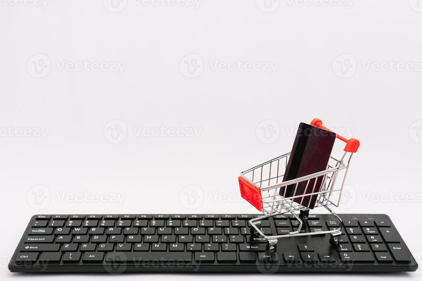 online shopping or internet shop concepts, with shopping cart symbol. isolated. photo