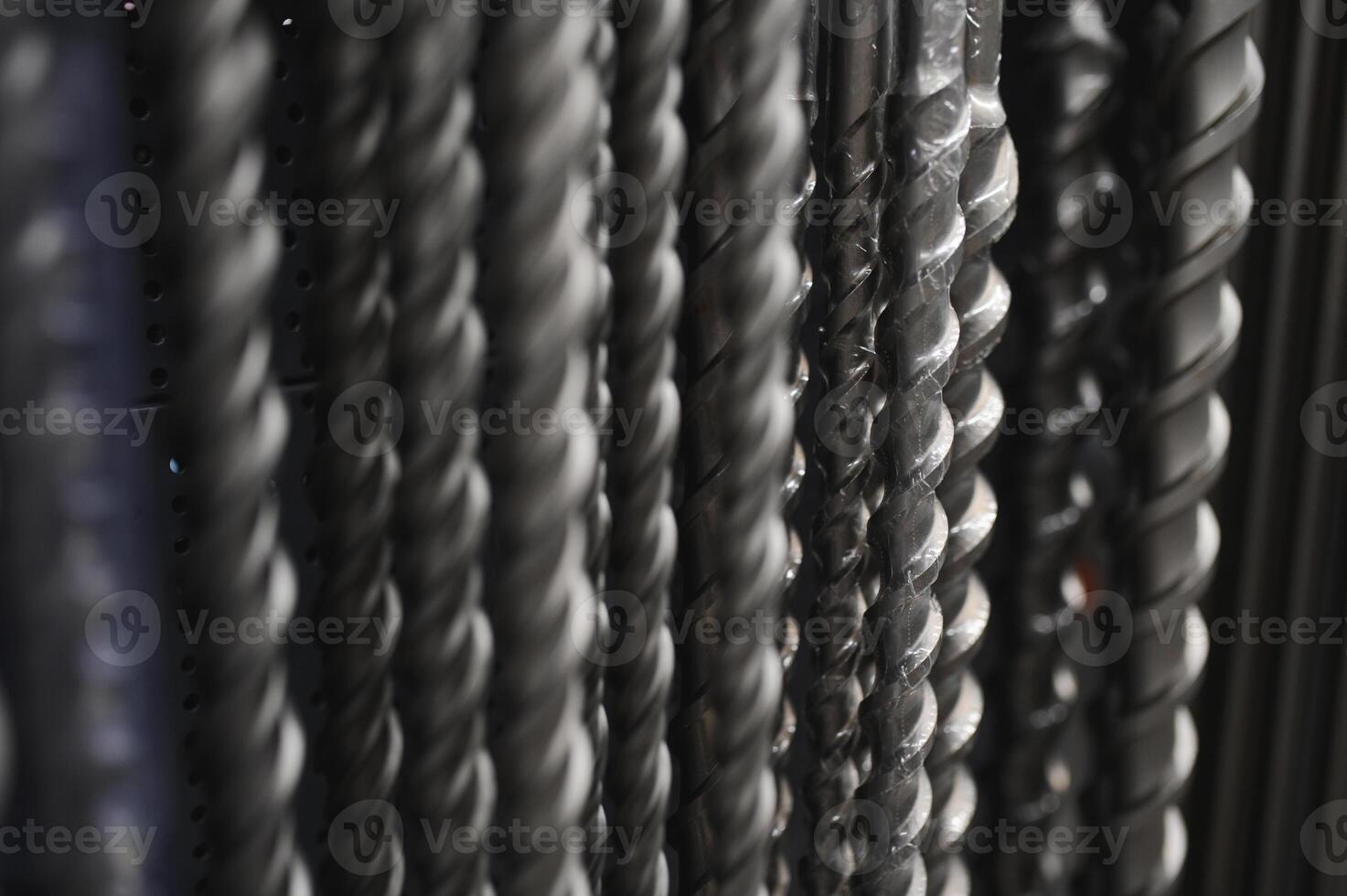 Drills for drilling concrete in a shop window of a hardware store. Close-up. Selective focus photo