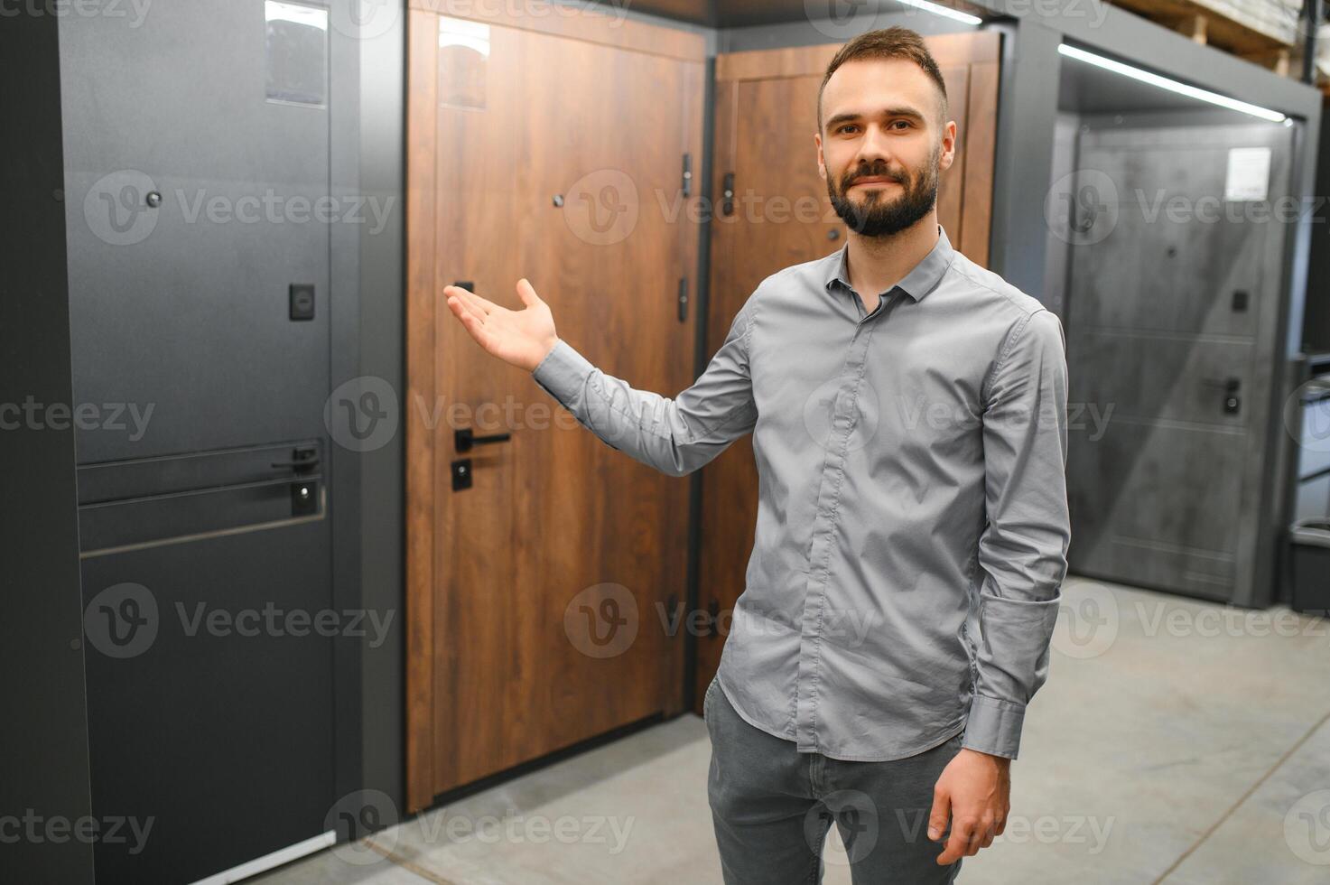 Seller of doors in a hardware store. Home repair concept. photo