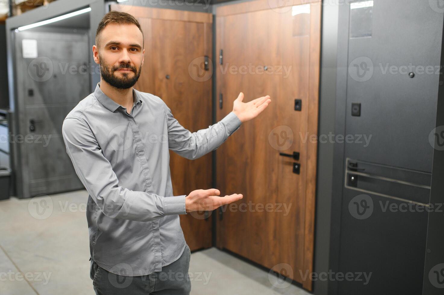 Seller of doors in a hardware store. Home repair concept. photo