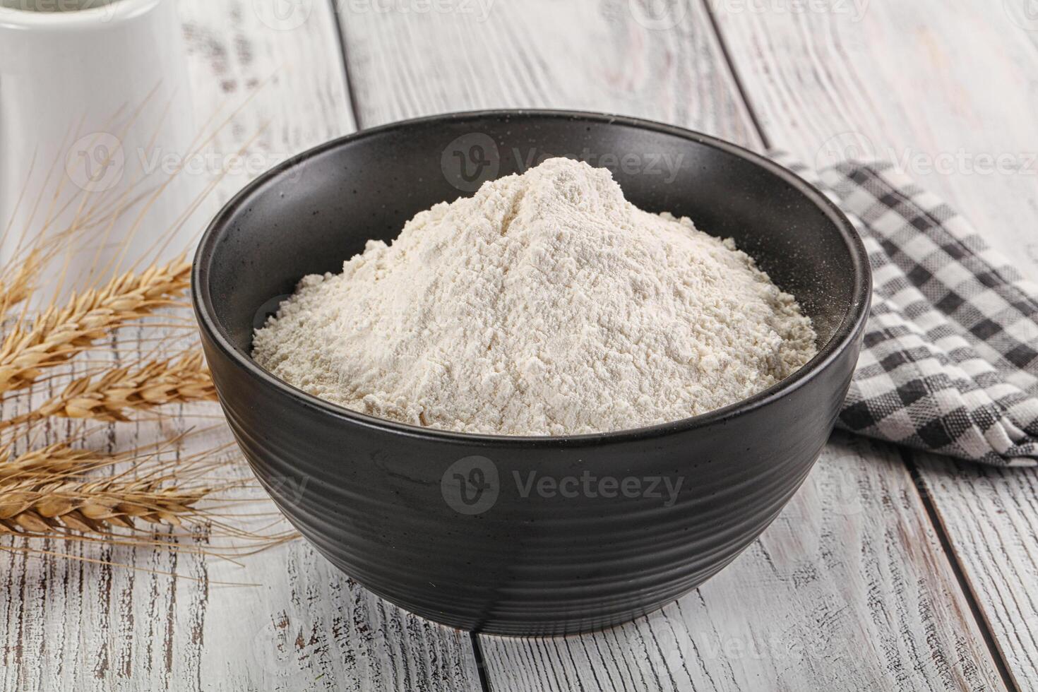 Wheat flour heap for bake photo