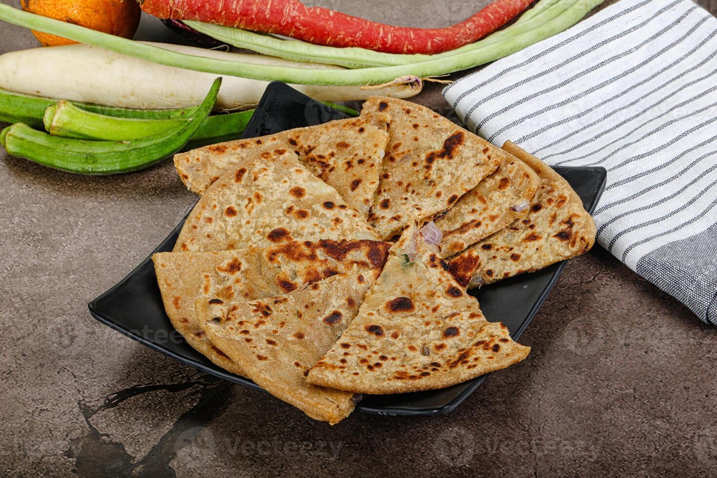 Indian Aloo Paratha - bread with potato photo