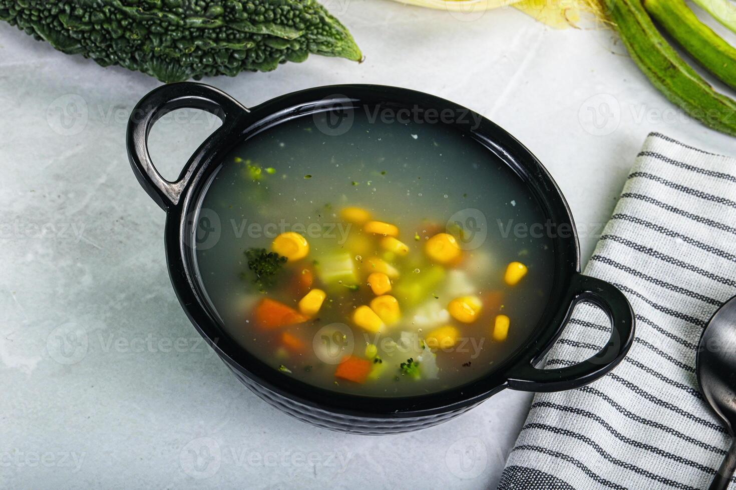 Soup with corn and broccoli photo