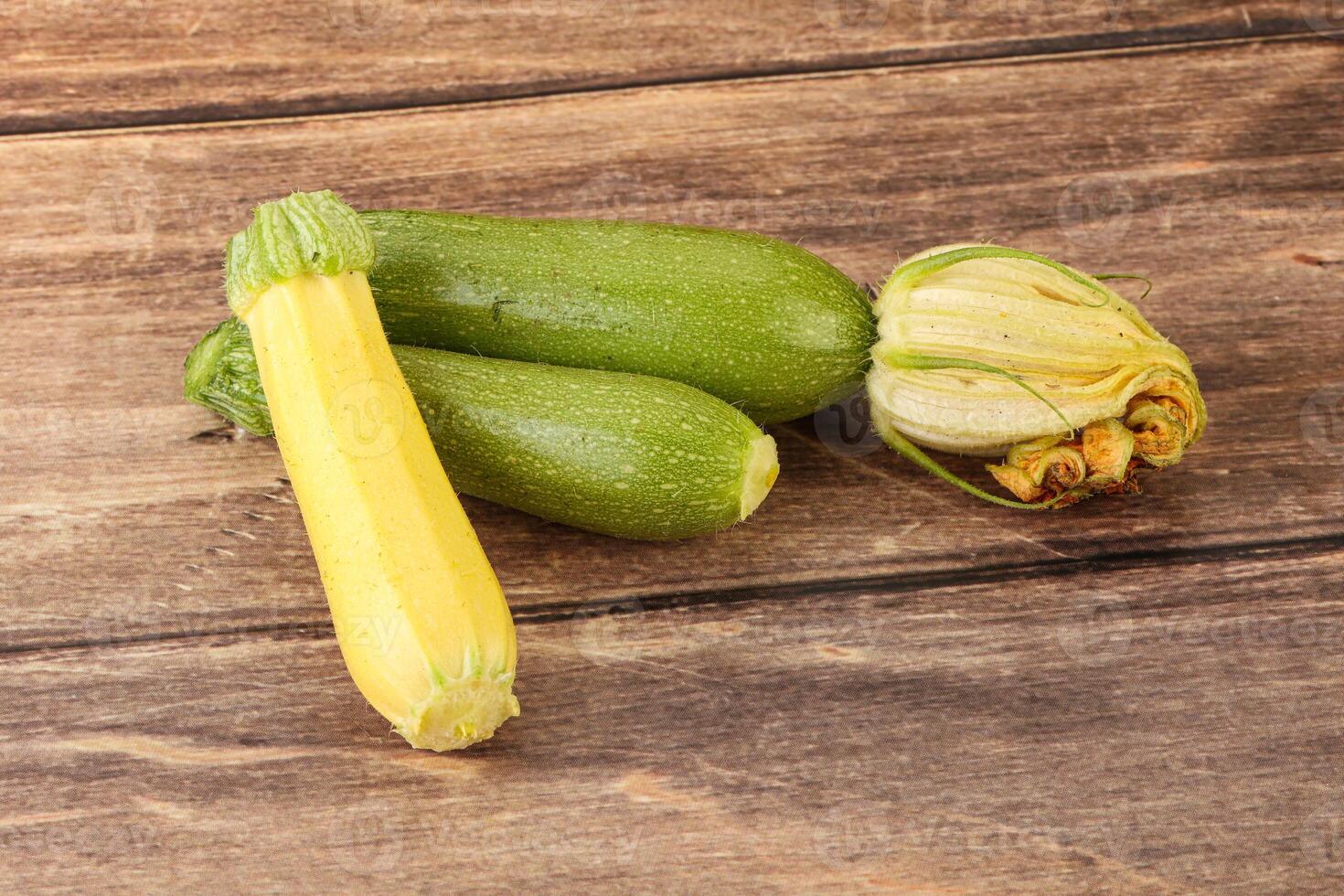 Raw baby organic zucchini heap photo