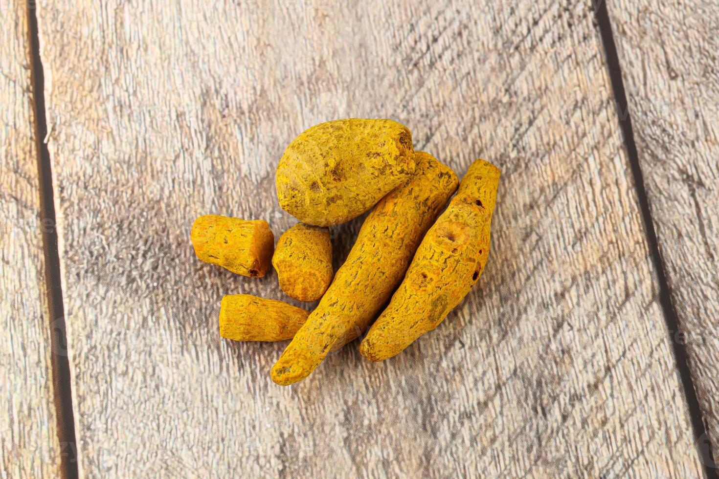 Indian spices - Turmeric root Curcuma photo