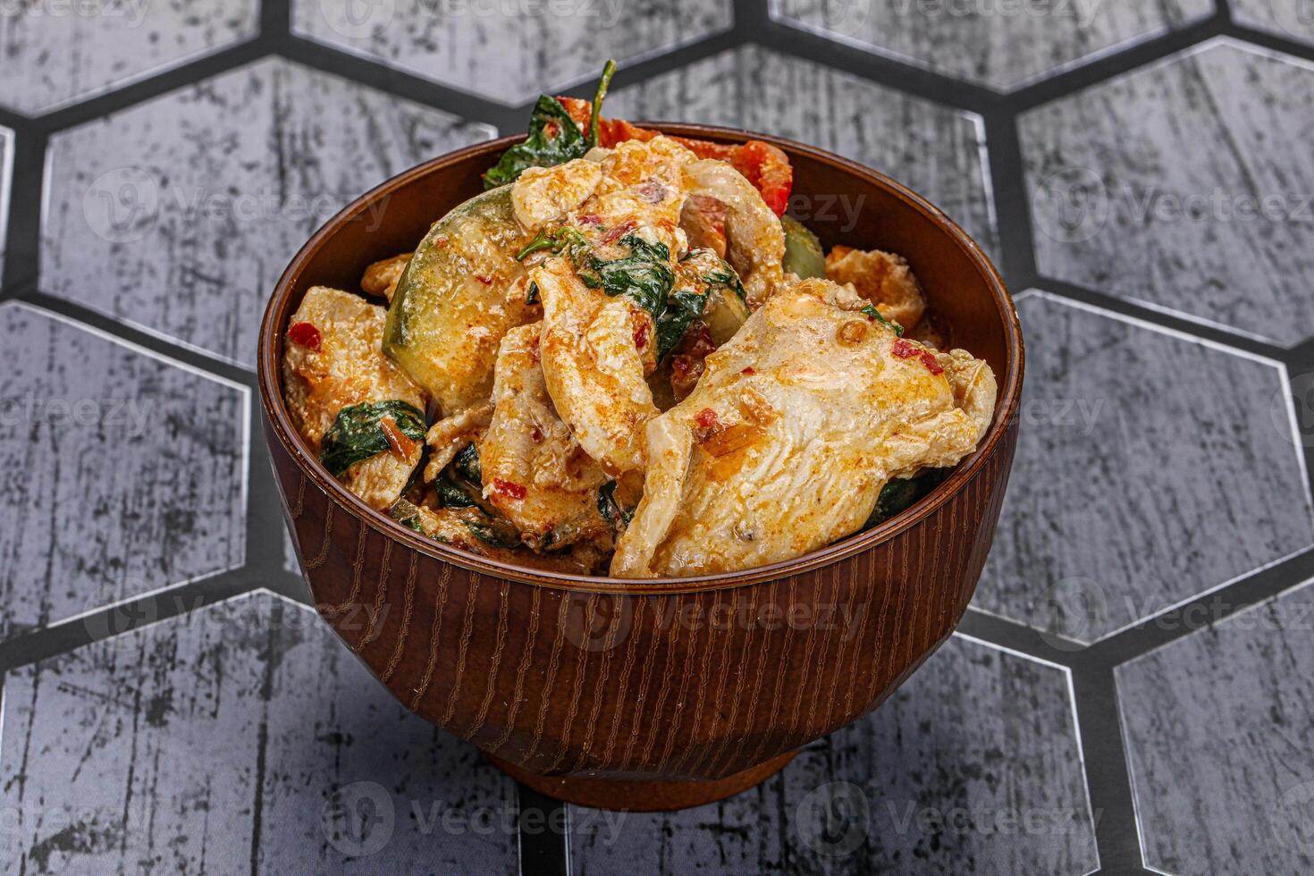 Thai red spicy curry with chicken photo