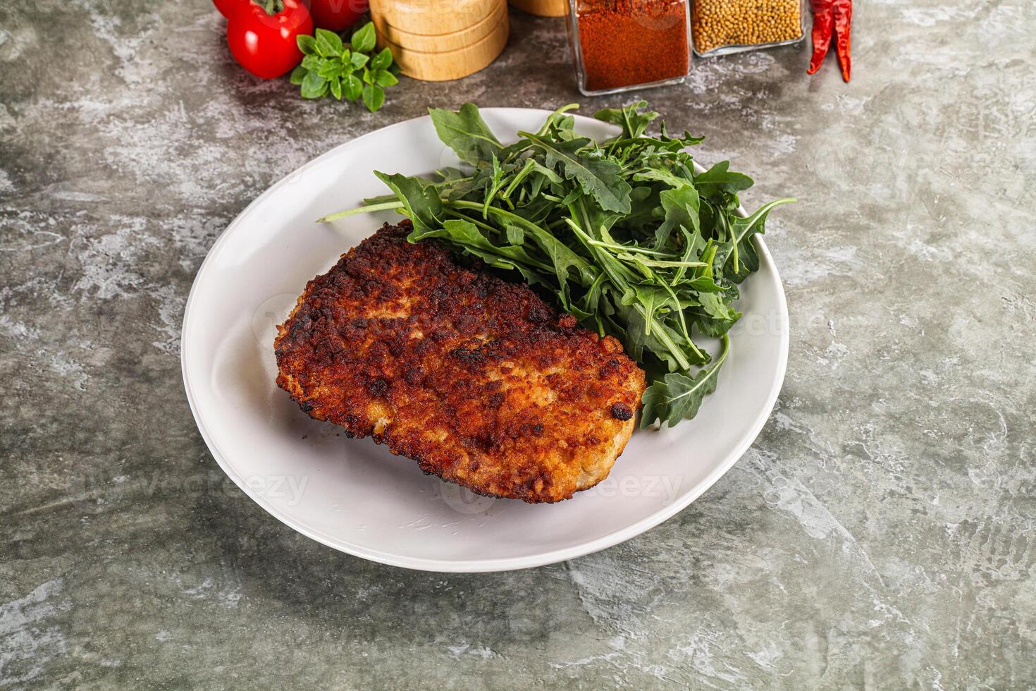 Tasty roasted breaded meat schnitzel photo