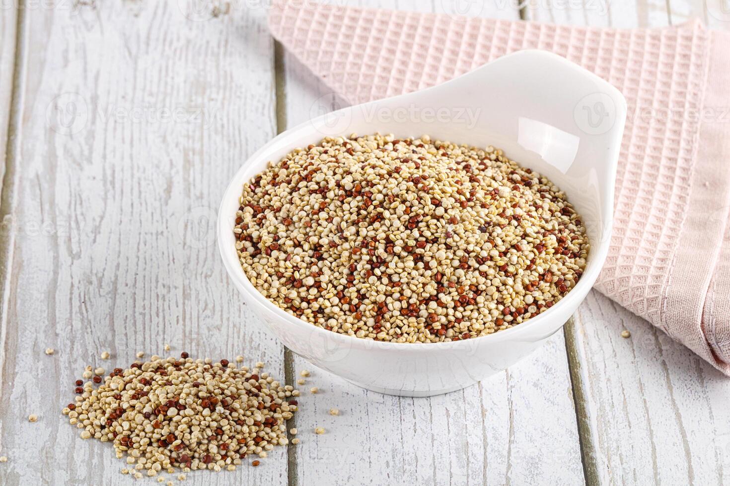 Raw dry quinoa cereal grain photo