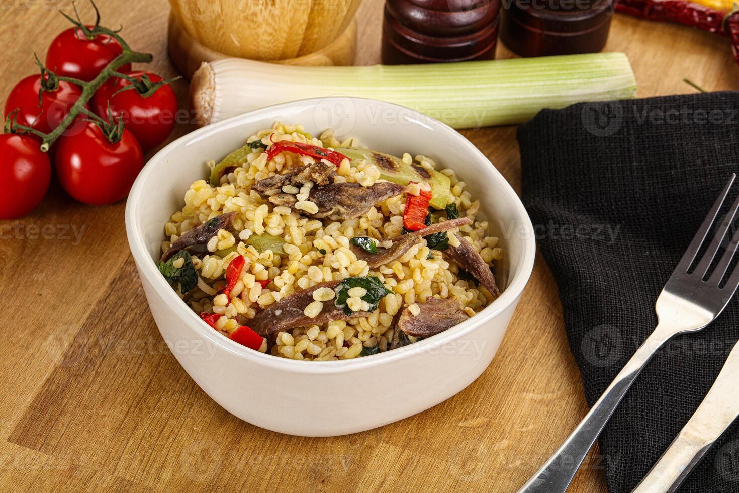 Bulgur with lamb and vegetables photo