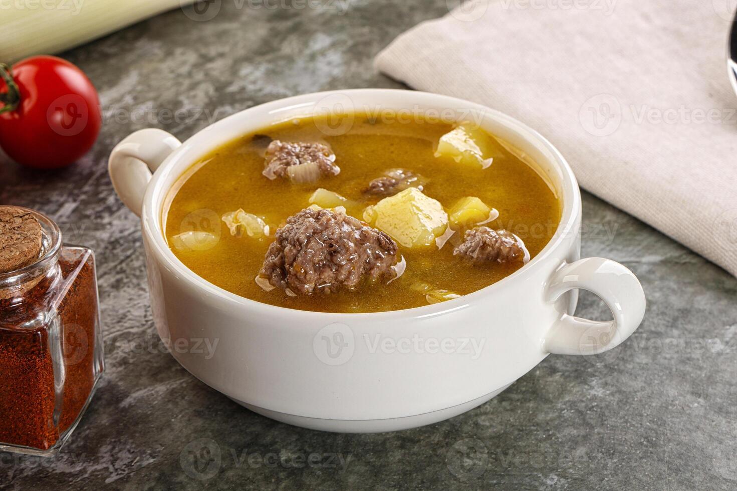 Soup with beef meatball and vegetables photo