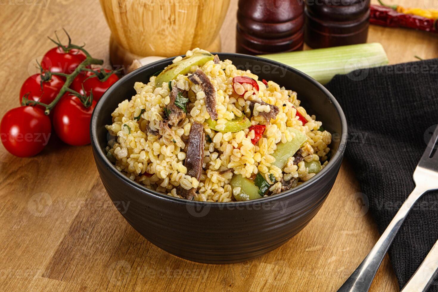 Bulgur with lamb and vegetables photo